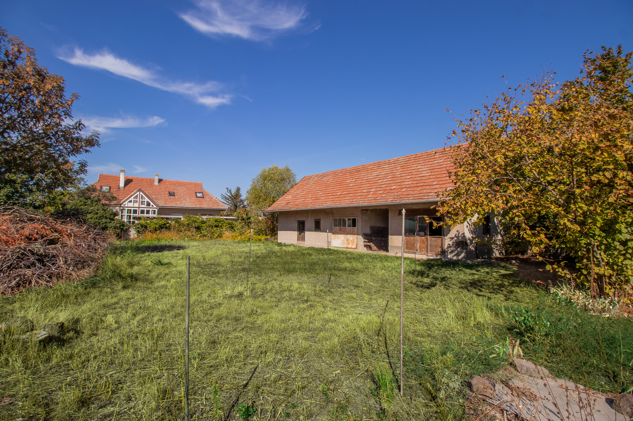 Yard, house and outbuilding